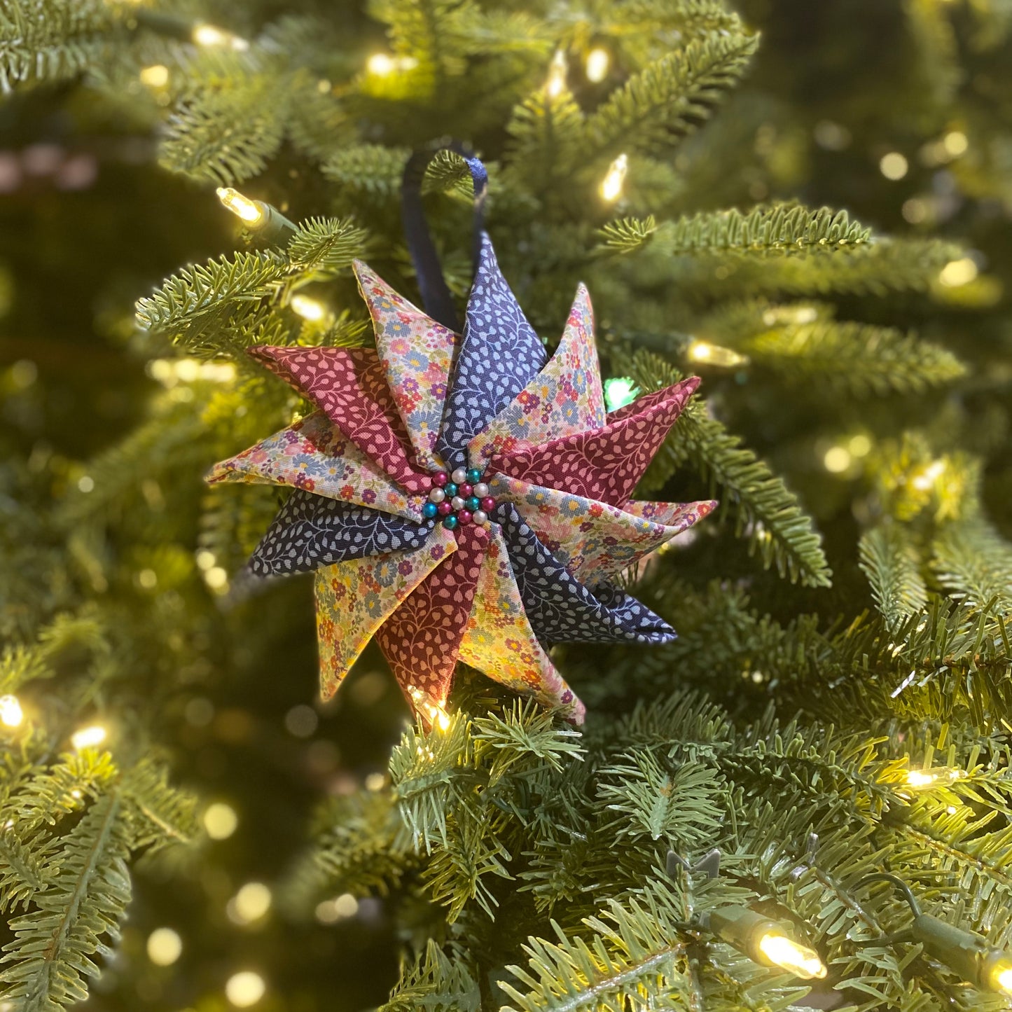 Christmas Ornament ~ Prairie Point Pinwheel (beaded center)