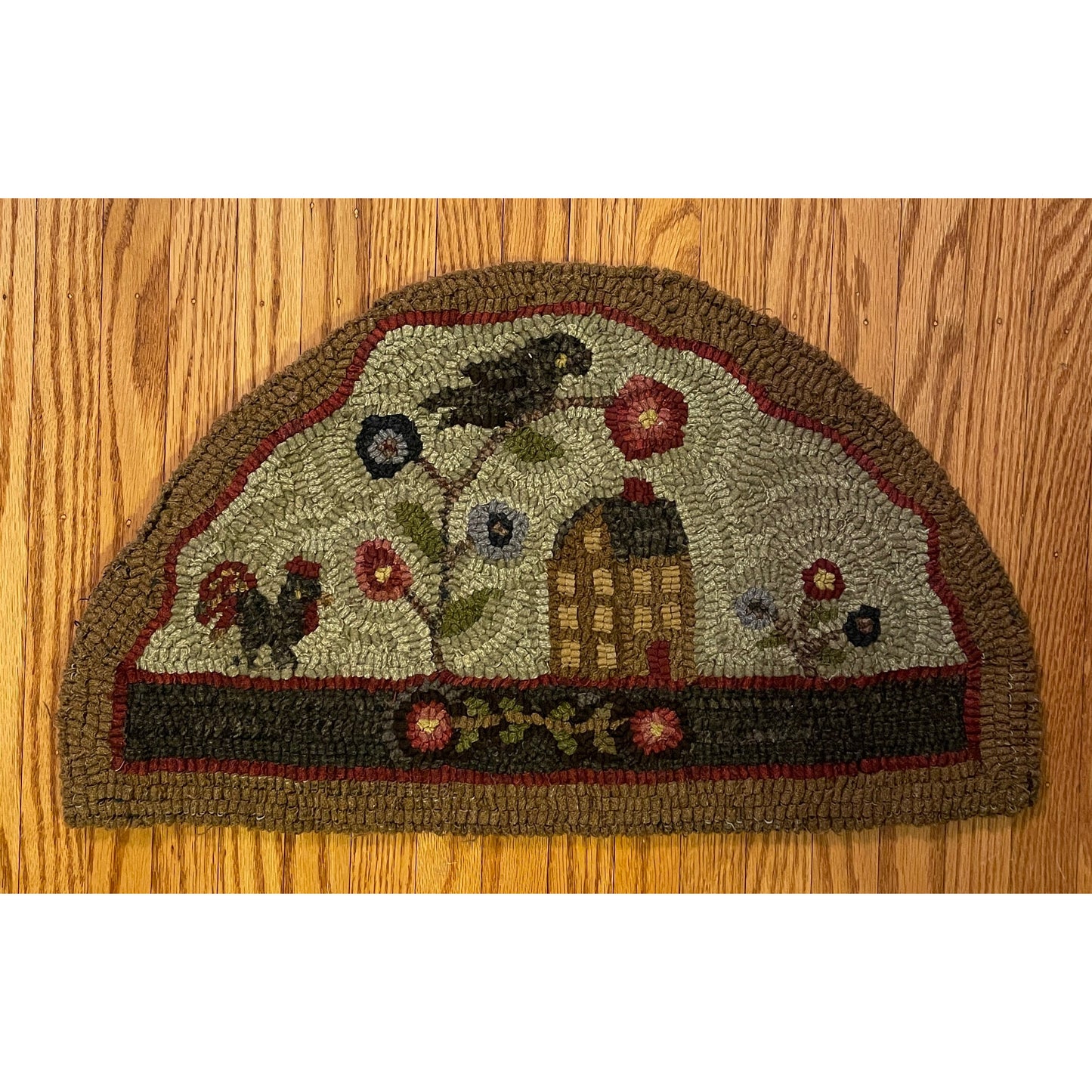 Hooked Wool and Braided Cotton Moose Round Accent Rug